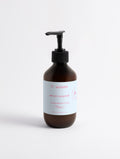 Sérum corporel pour la peau de soie, ambre boisé et cuir femme